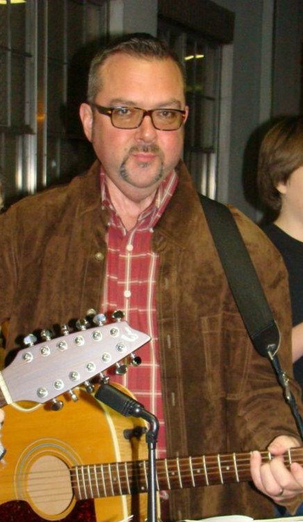 Keith Davis Playing the Guitar